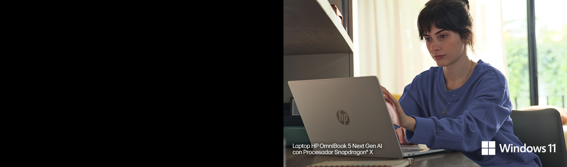 Imagen de una mujer trabajando en su Laptop HP OmniBook 5 Ne...